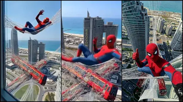فيديو وصور.. الرجل العنكبوت على أبراج العلمين الجديدة استعدادا لعرضه بالسينمات
