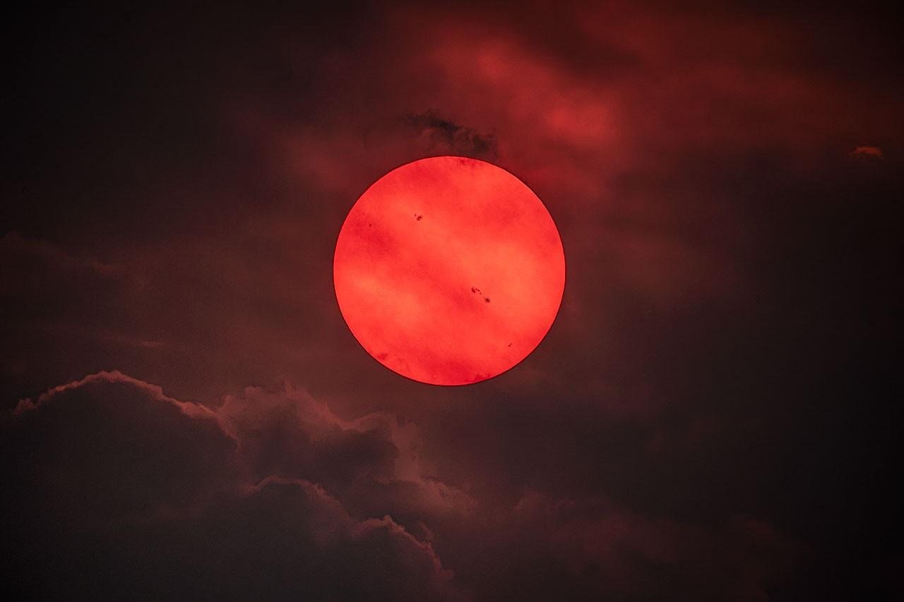 APOD: July 30 – Red Sun trough...
