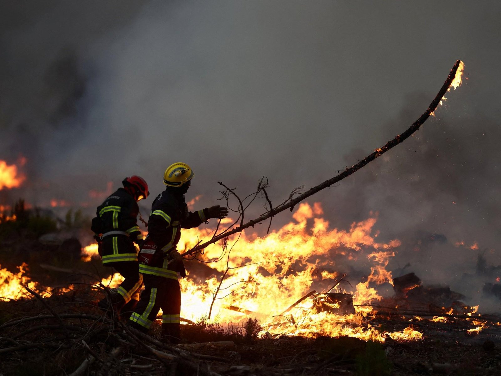 More than 360,000 evacuated as wildfires rage in France and Spain